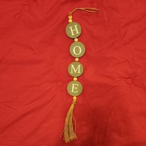 Green HOME Wall Hanging with Tassel